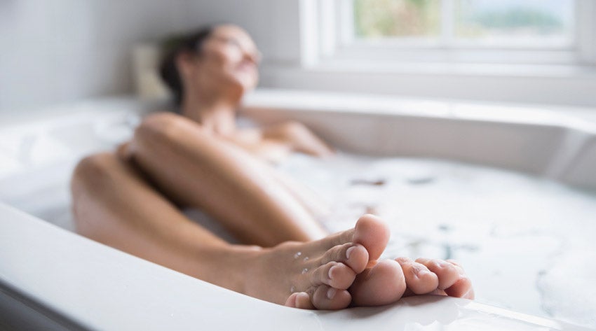 mother having a bubble bath