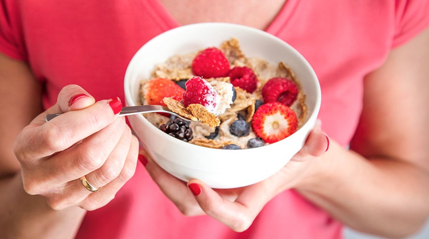 a bowl of cereal with berries