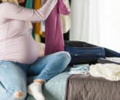 Pregnant woman checking hospital bag
