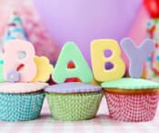 Cup cakes with baby decorations