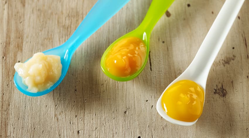 Baby spoons with baby food