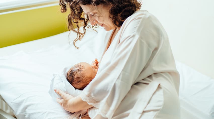 mother-breastfeeding-newborn-after-caesarean
