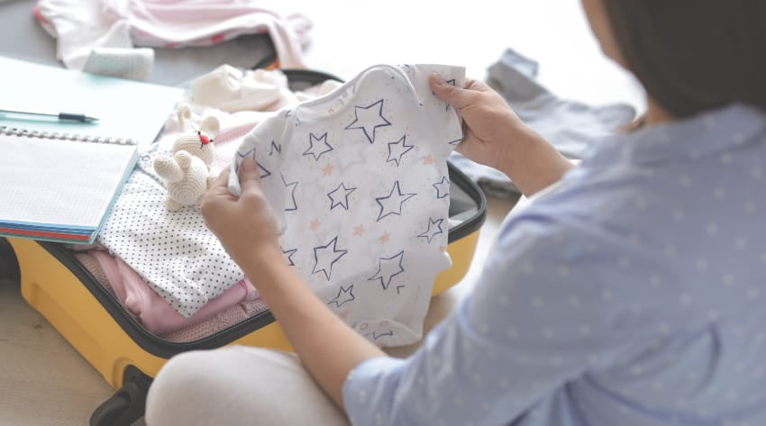 Pregnant mother packing her hospital bag