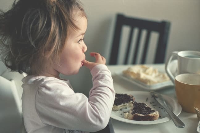 A child eating her meal