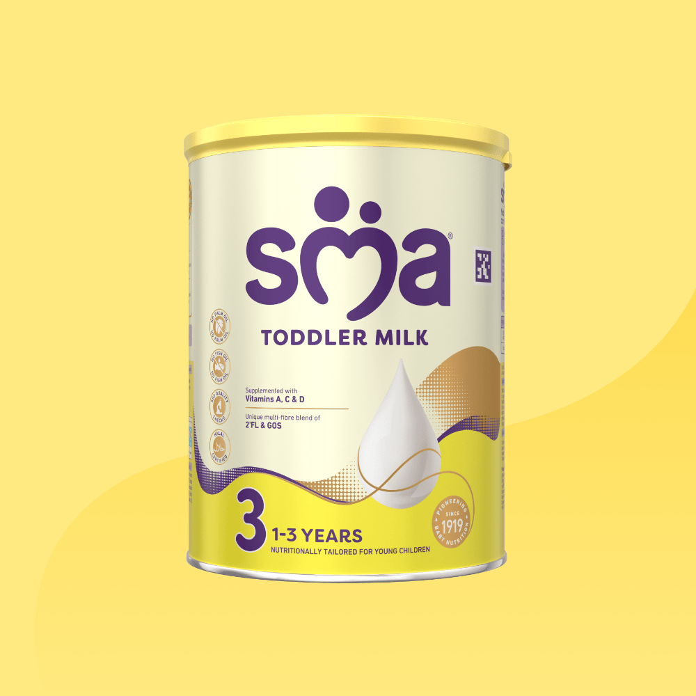 Tin of SMA Toddler Milk Powder for children 1 to 3 years, on a yellow background.